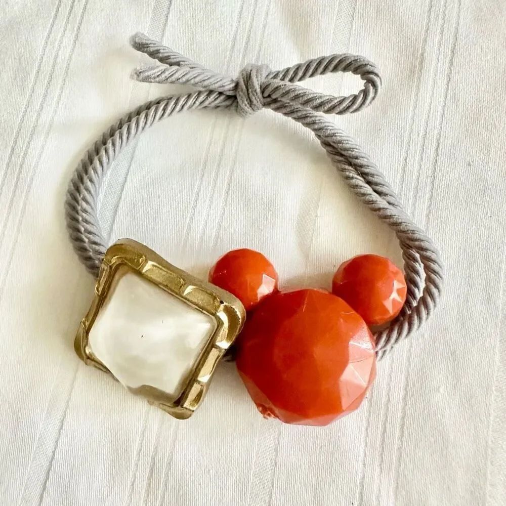 Orange, white, and gray color Mickey Mouse hair tie